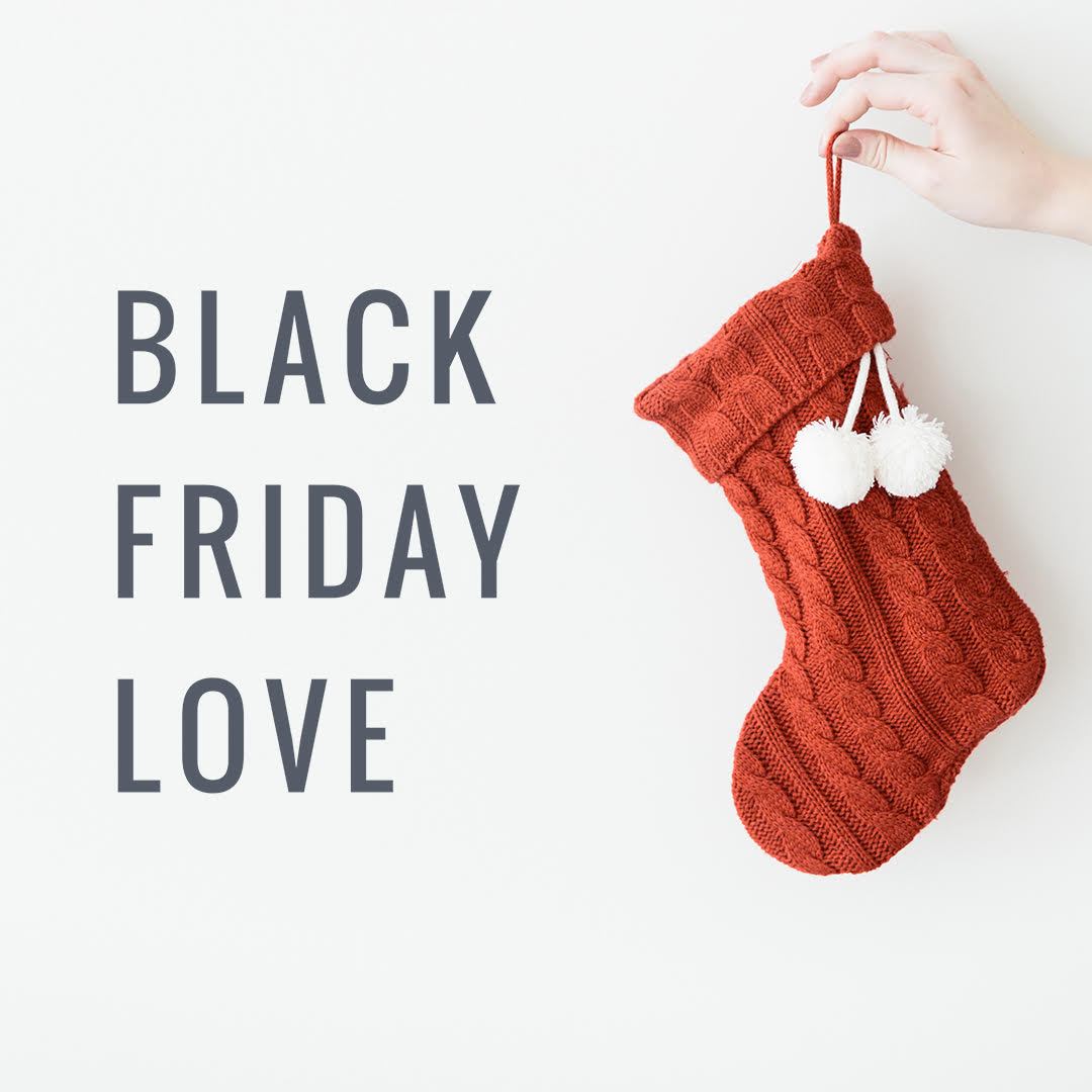 A red color sock with a quote stating Black Friday Love